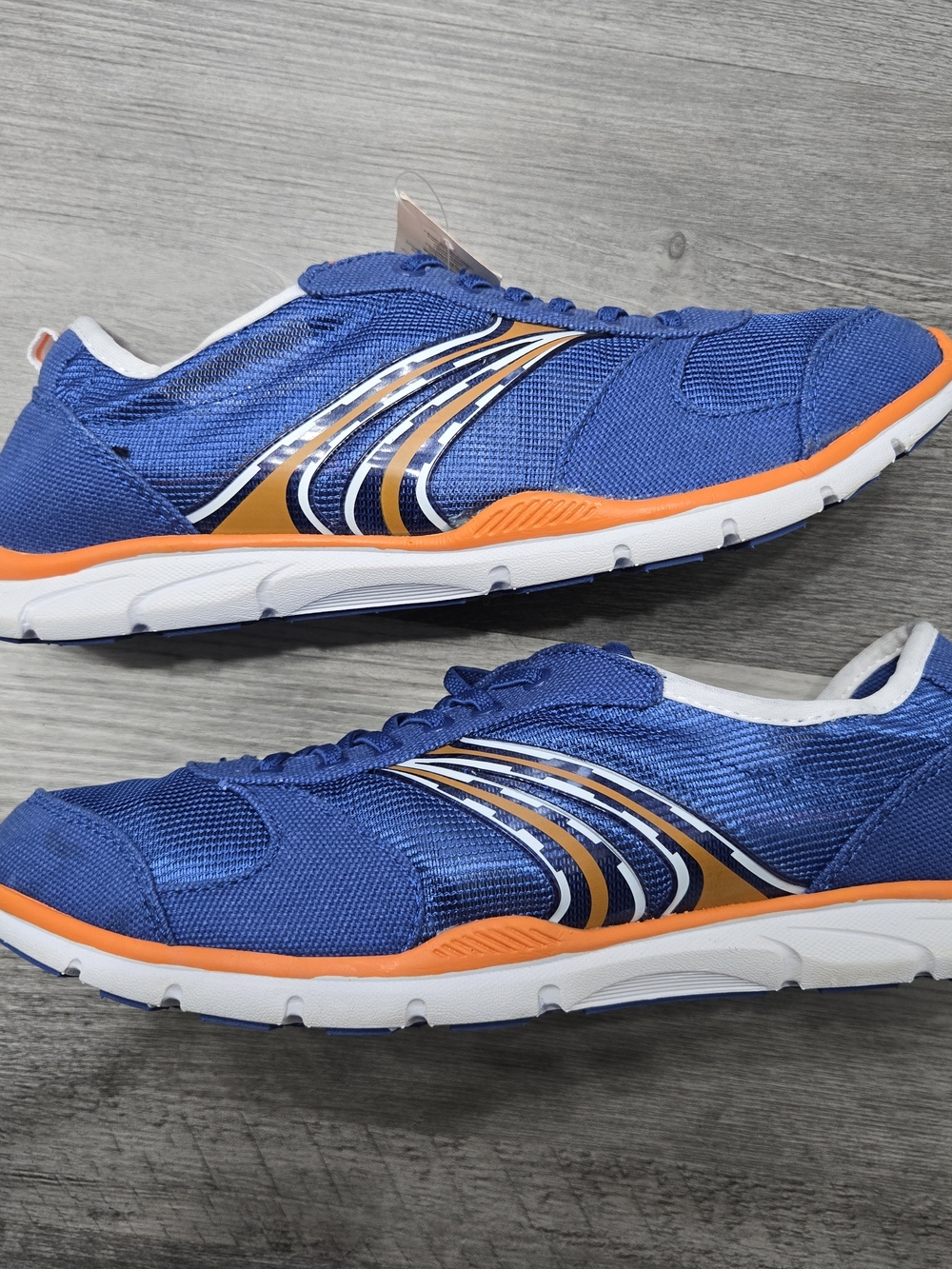 Danskin blue and orange  sneakers are designed for athletic activities. - Picture 2 of 6